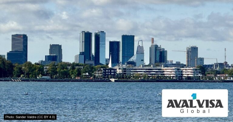The modern office towers of Tallinn's business district seen across the water